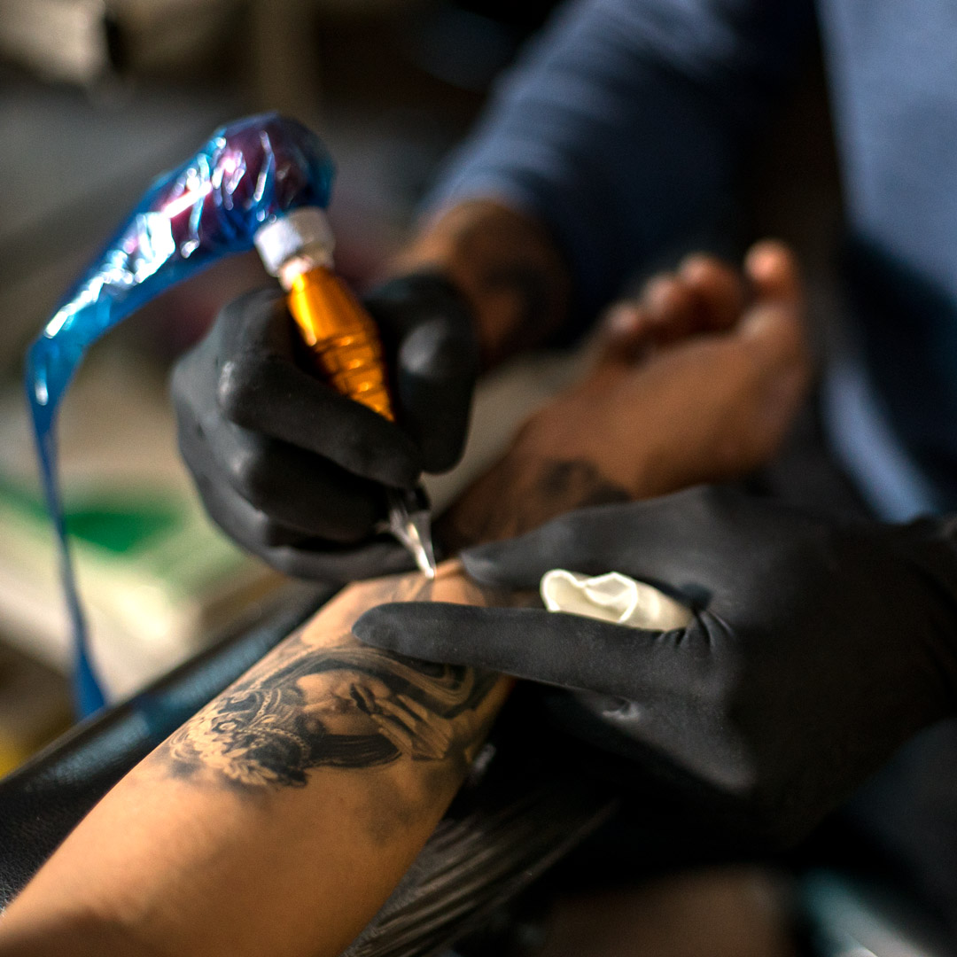 Eric busy at work on a tattoo.